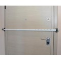 Adjustable safety bar for entry doors of all types