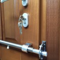 Adjustable safety bar for entry doors of all types cleverlok